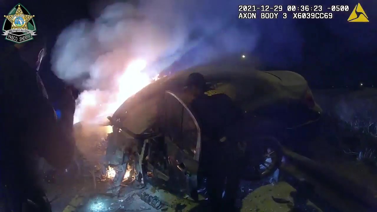 Body camera video shows Florida deputies rescuing person trapped inside burning car
