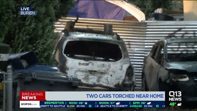 Two cars torched near home