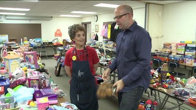 Kramp checks out toys at St. Joseph Rummage Sale
