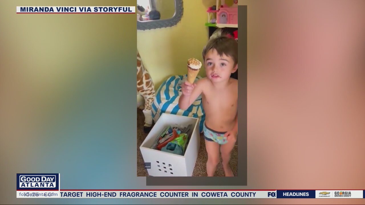 Little boy hides to try to sneak ice cream treat