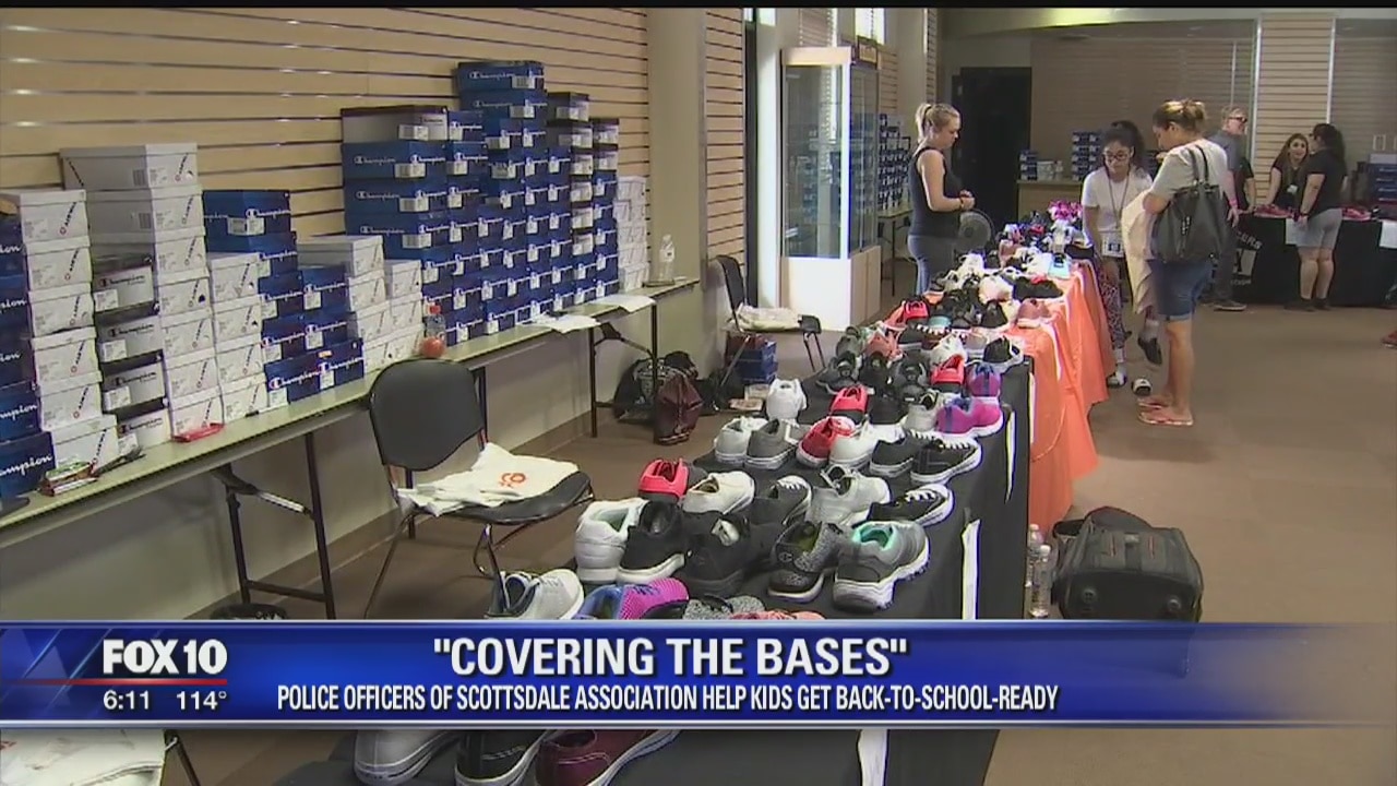 Volunteers, police help get Valley kids ready to go back to school