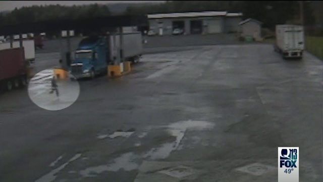 Man stows away under semi to get away from cops