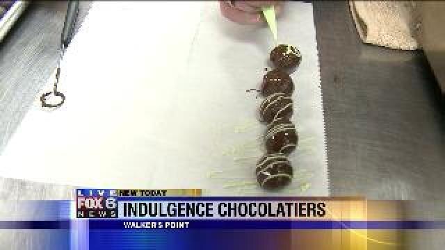 Laura decorates chocolate treats