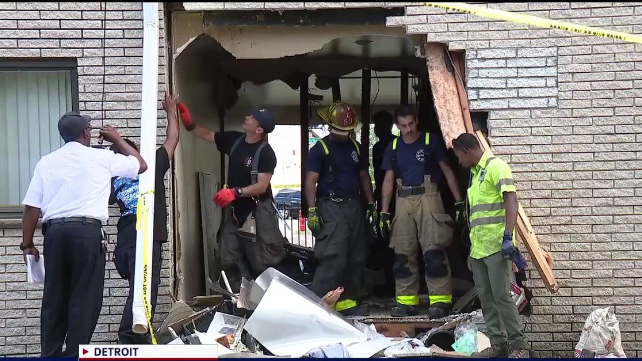Driver crashes completely through Detroit apartment