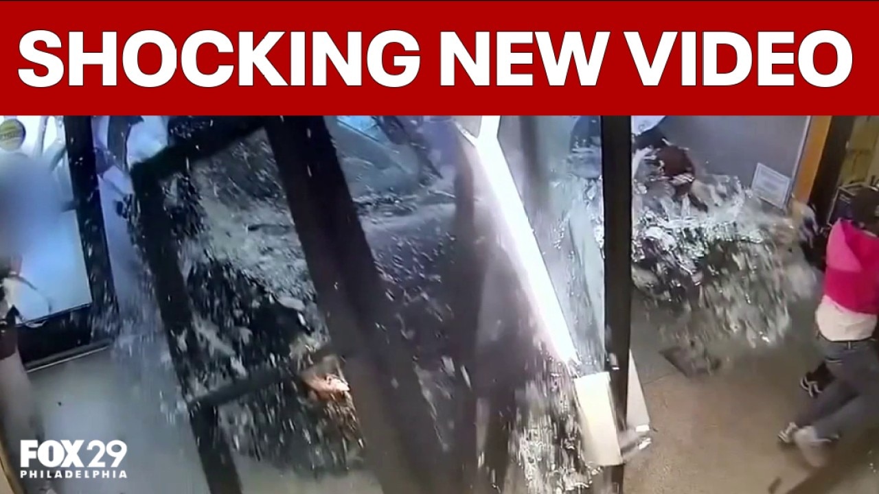 New video shows driver crash into Philly police station