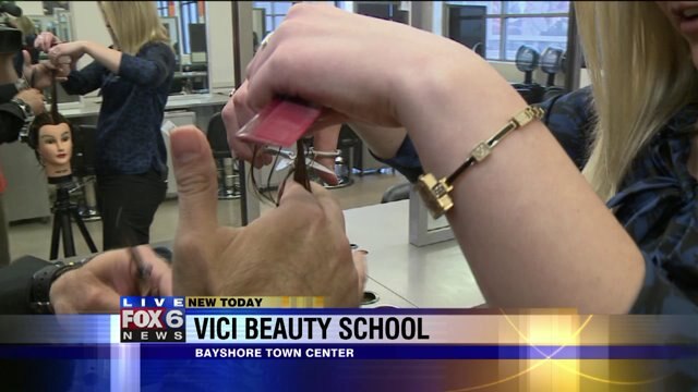 Laura learns the art of cutting hair