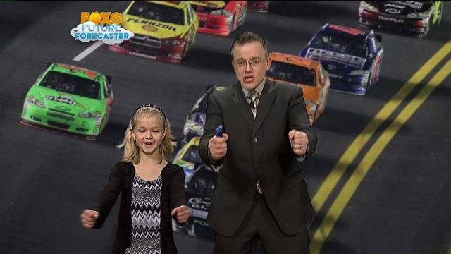 Madison helps FOX6 Meteorologist Rob Haswell with the weather