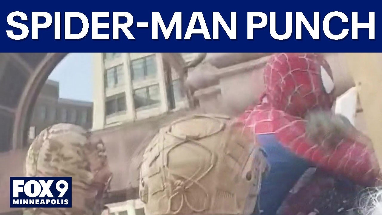 Spider-Man counter-protester punches Jake Lang