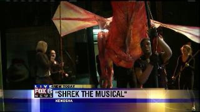 Laura checks out props on Shrek the Musical