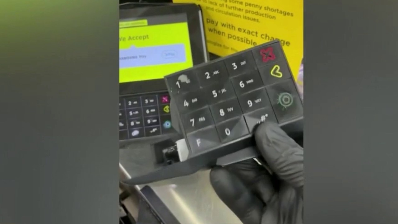 Thieves hide thick plastic skimmers on card readers