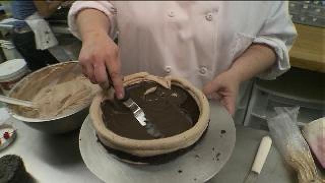 Tony helps make cake at Sciortino's Bakery