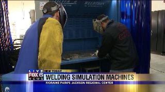 Justin gets a welding lesson