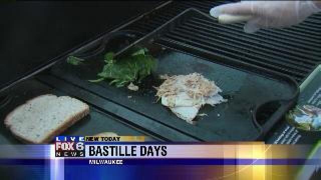 Laura checks out food at Bastille Days
