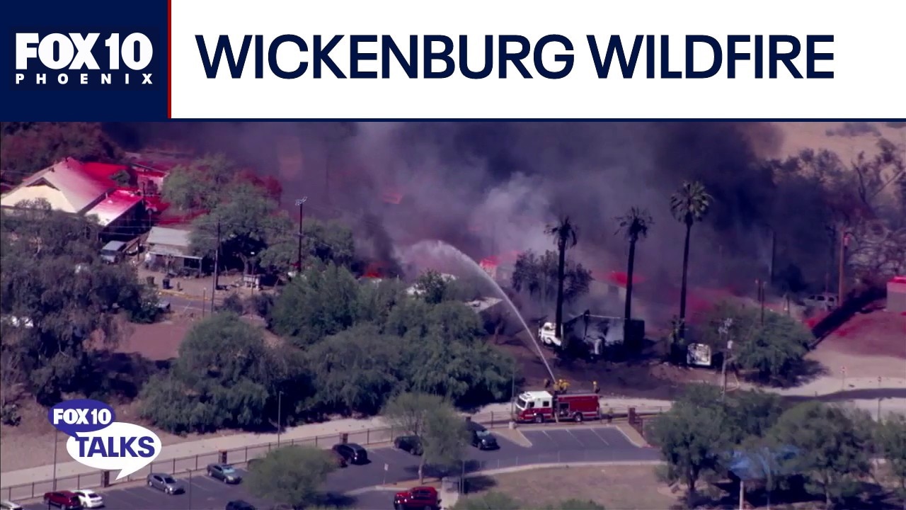Crews battling wildfire northwest of Phoenix