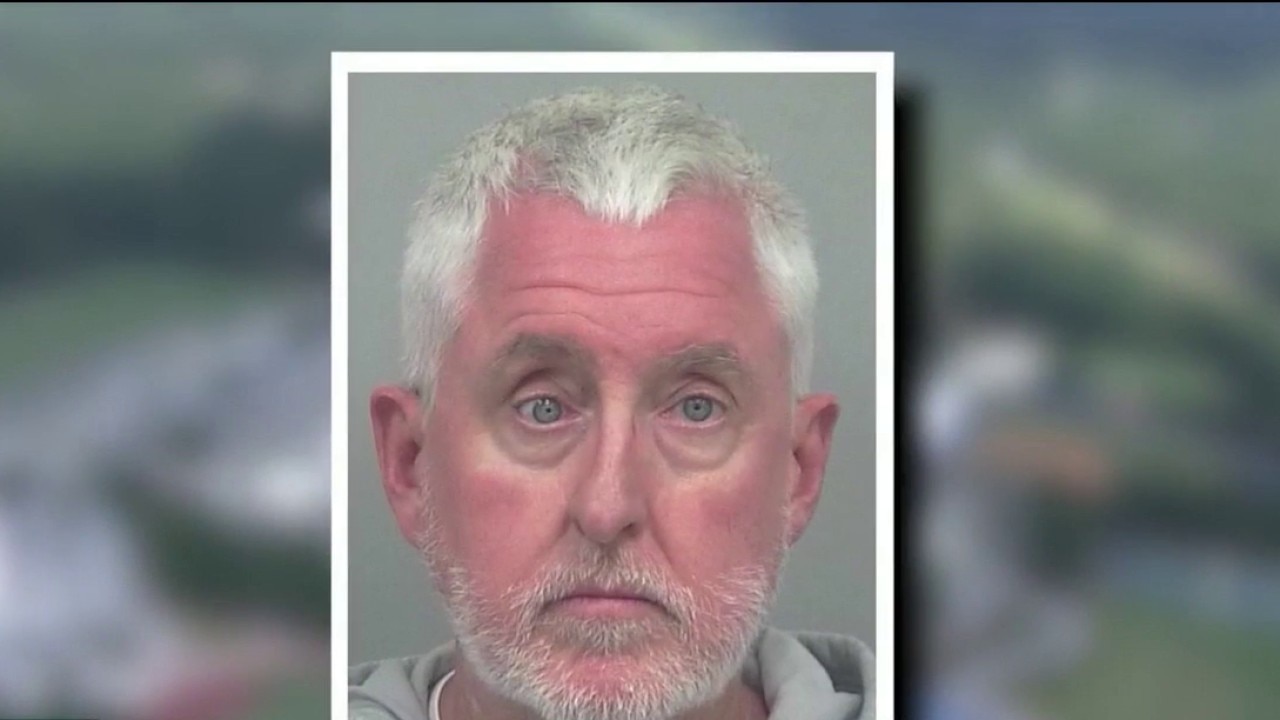 Police reveal former track coach spent booster funds on travel