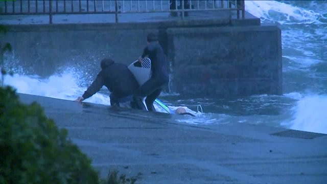 Windsurfer pulled from waves at Alki Beach