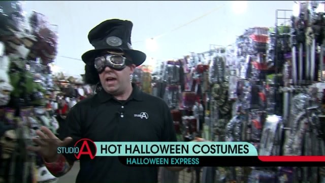 Checking out hot costumes at Halloween Express