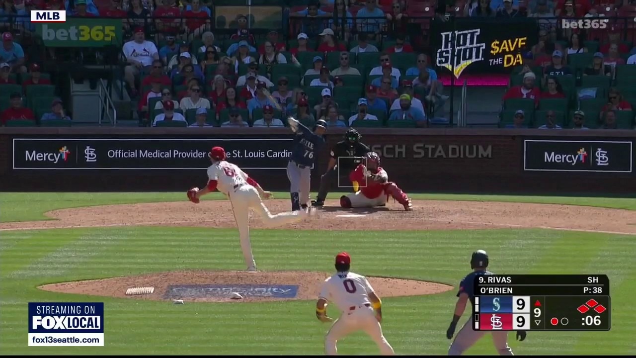 Mariners rally late to beat Cardinals 11-9