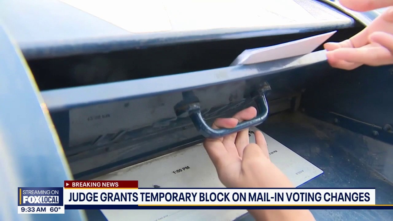 Judge grants temporary block on mail-in voting changes