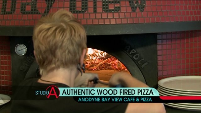Preparing a wood-fired pizza in Bay View
