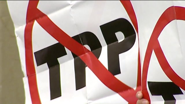 Chaotic scene: Anti-TPP protesters shout at U.S. Rep. Ron Kind after speech at DNC