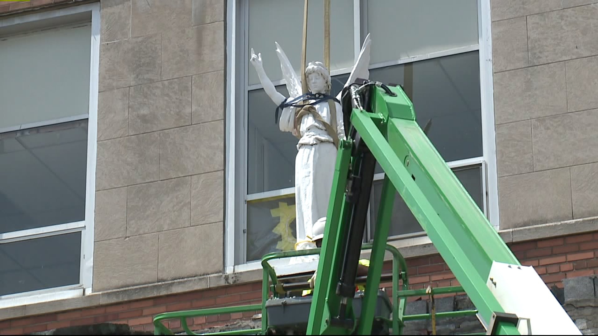 Angel statue lowered at St. Rita`s Church