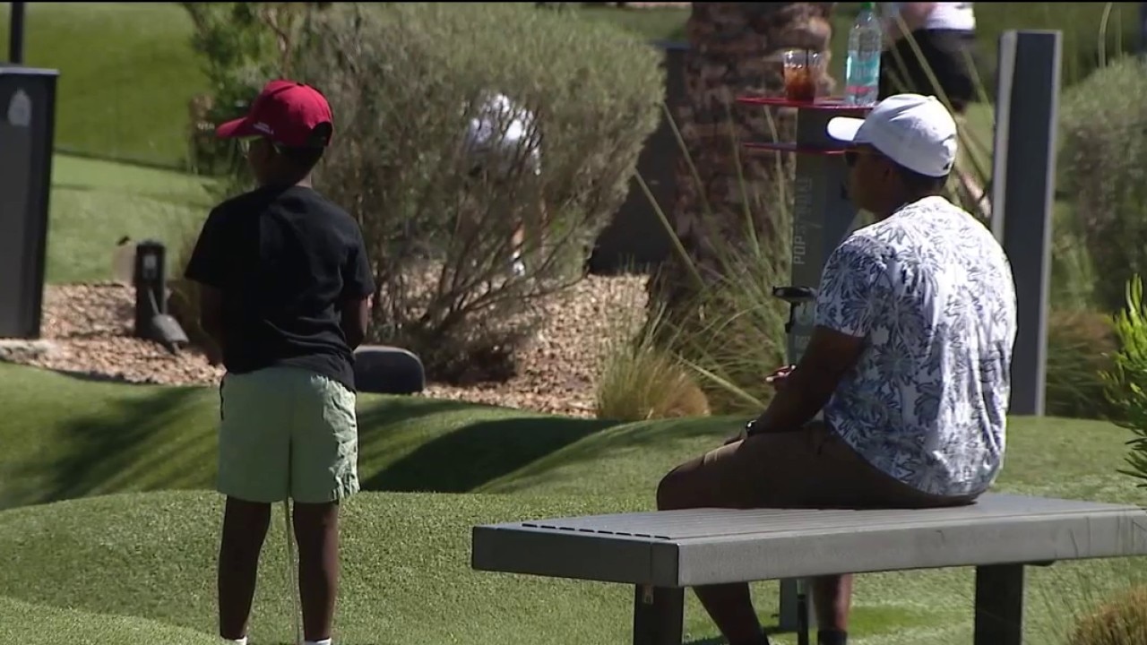 Dads celebrate Father's Day at the 'mini' golf course