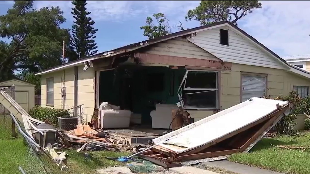 Fiery hit-and-run crash destroys home