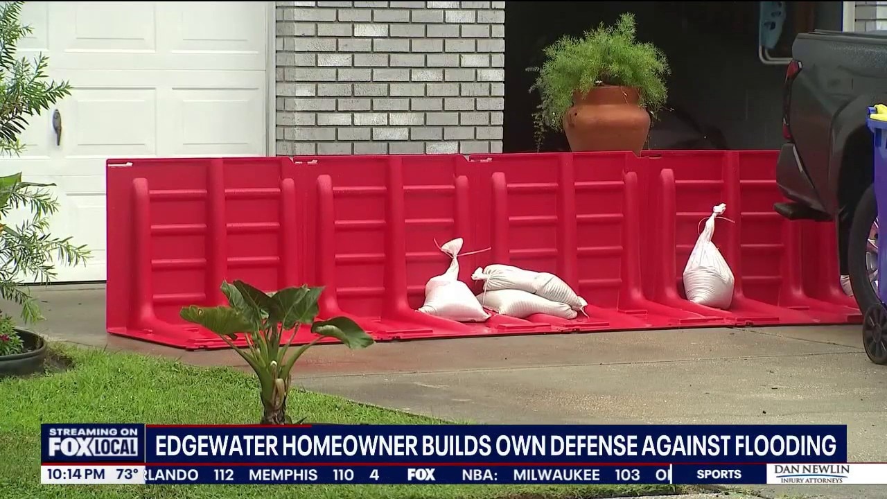 Woman flood proofs home with berm, pipes, pumps 