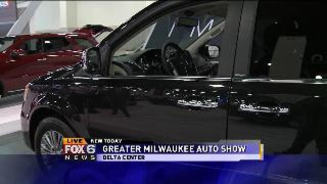 Laura checks out Dodge vehicles at Greater Milwaukee Auto Show