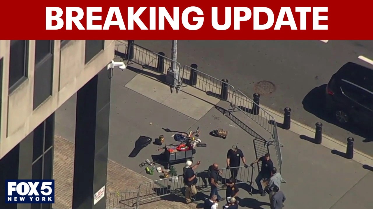 Fireworks explode outside of NYC's immigration court at 26 Federal Plaza