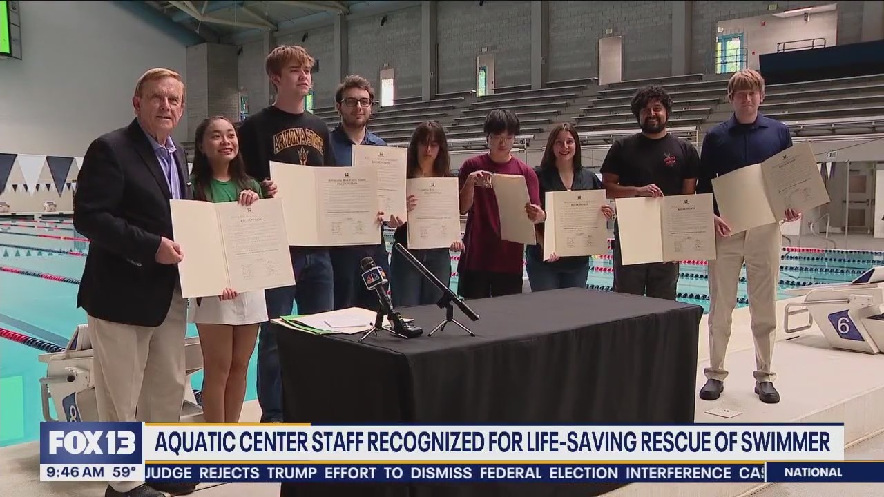 Aquatic center staff recognized for life-saving rescue of swimmer
