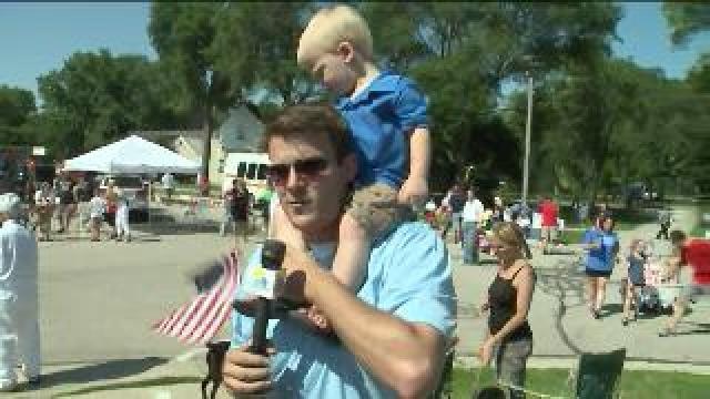 Chip has help from little fan while celebrating 4th of July