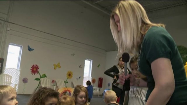 Laura has a blast talking with kids at The Big Backyard