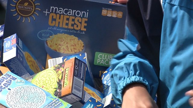 Kids make a huge donation on National Macaroni & Cheese Day