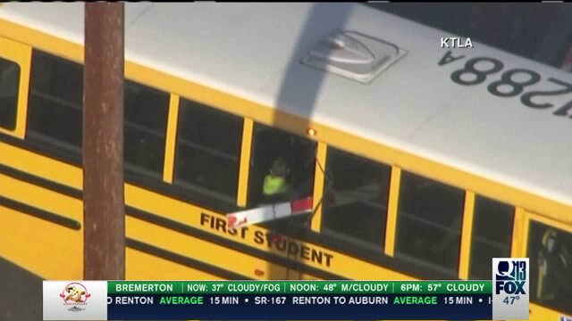 Railroad arm impales school bus, lands in student`s lap in Los Angeles