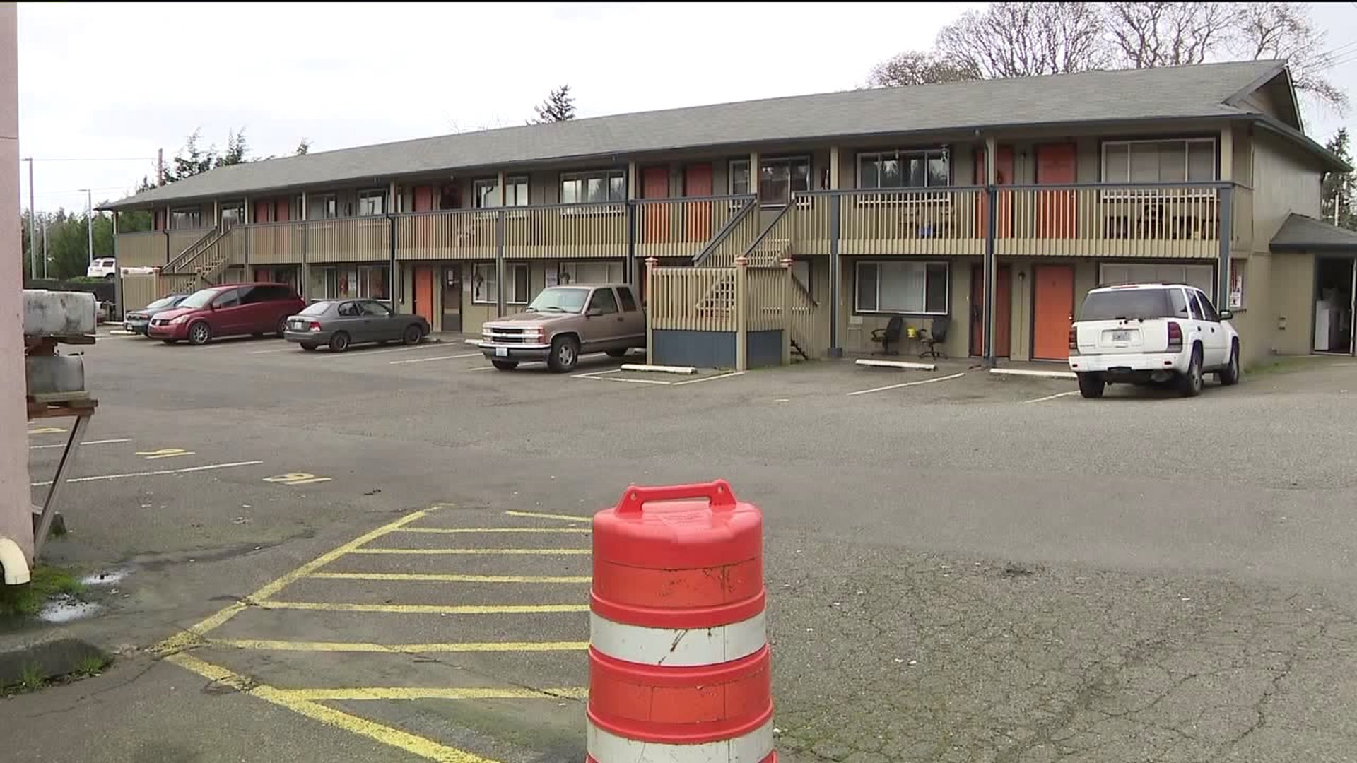 Police: Masked gunman kills woman during home invasion