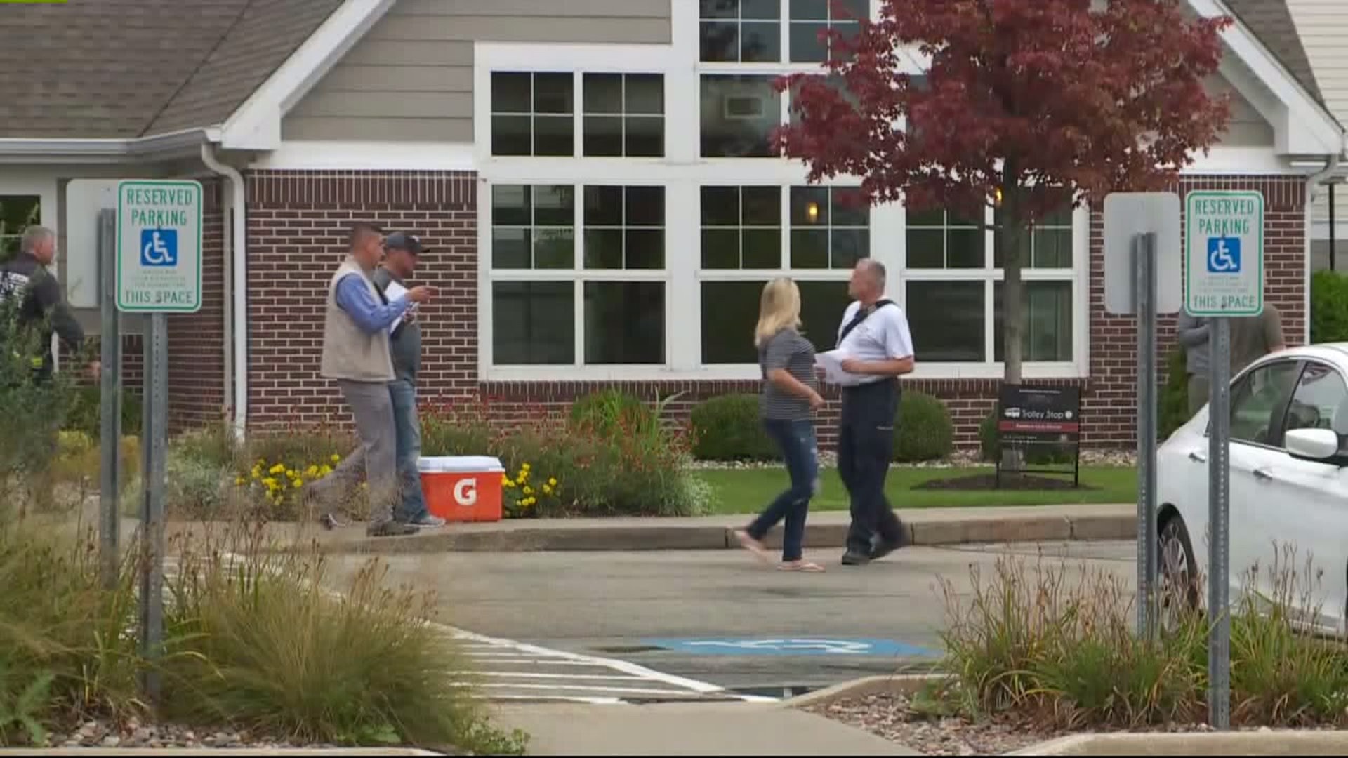 Workers return after shooting