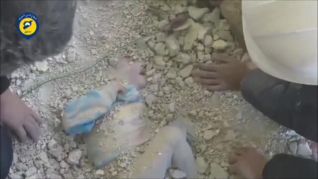 Girl, 5, pulled alive from Damascus rubble in dramatic video