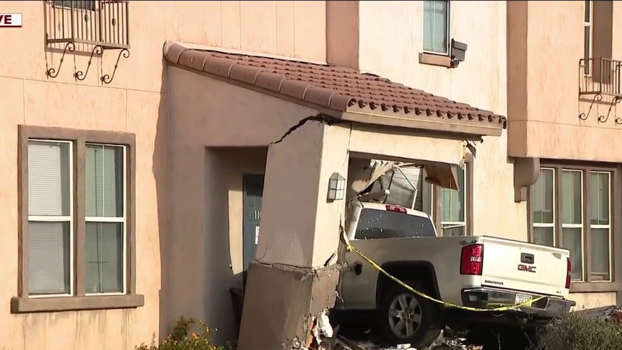 Truck crashes into front of Phoenix home