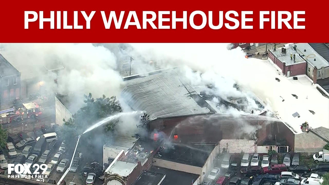 Firefighters battle 2-alarm fire at Kensington warehouse