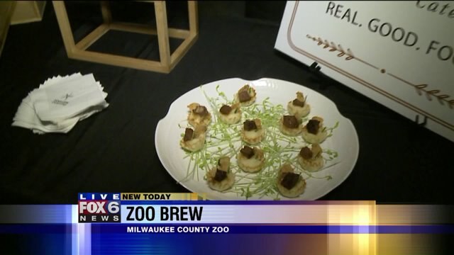 Laura checks out food drom North Star Catering, beverages from St. Francis Brewery