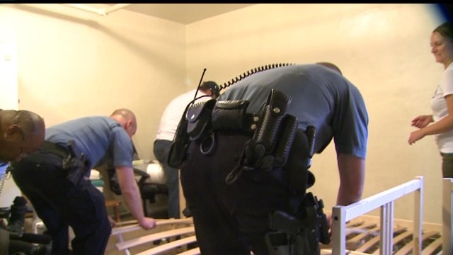 Seattle police officers deliver 40 beds to families in need