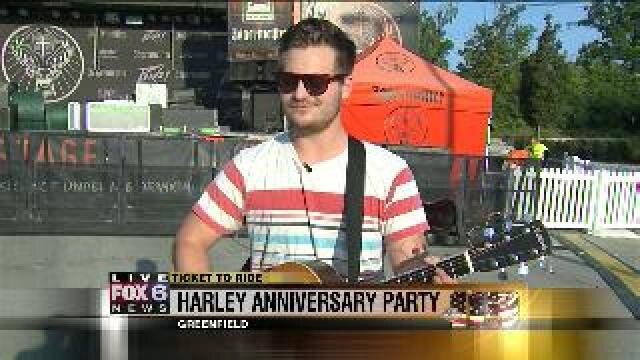 Laura checks out music for Harley 110th at House of Harley