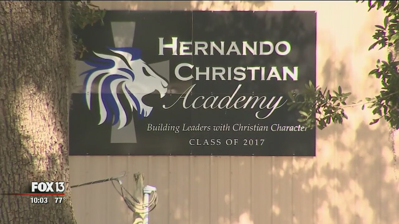 Principal's husband accused of raping students