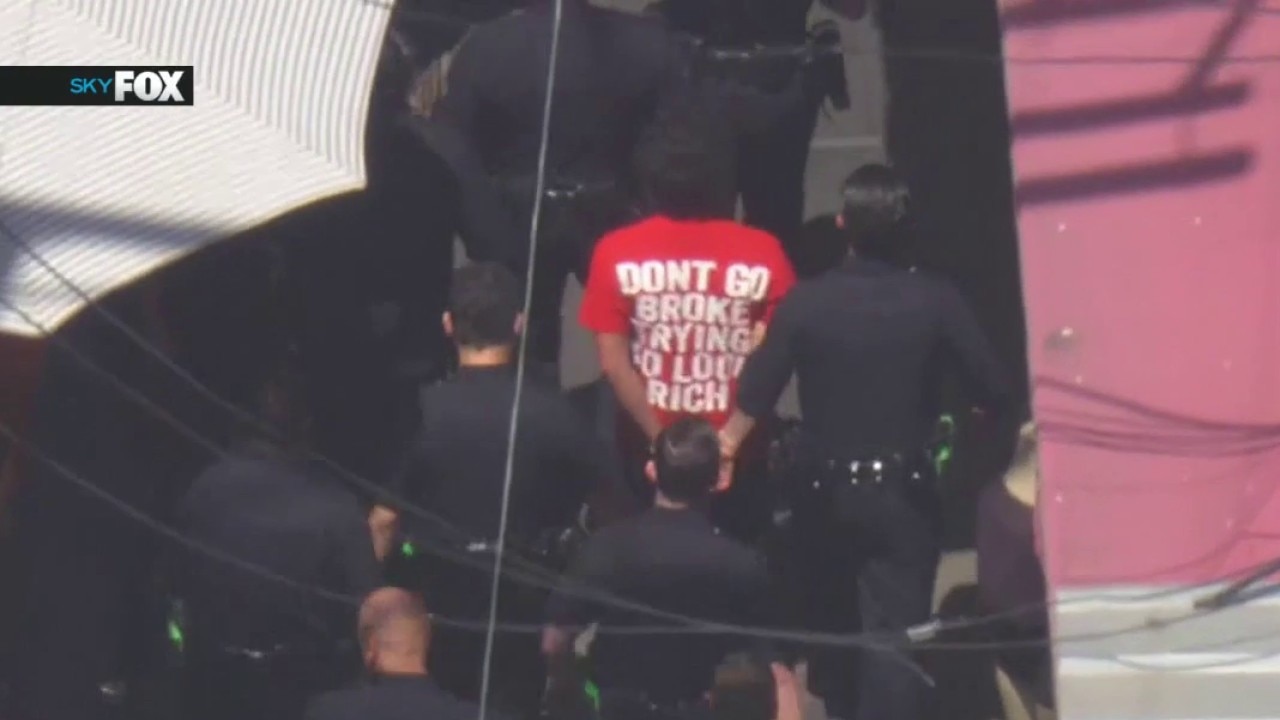 Robbery suspect pursuit ends in DTLA
