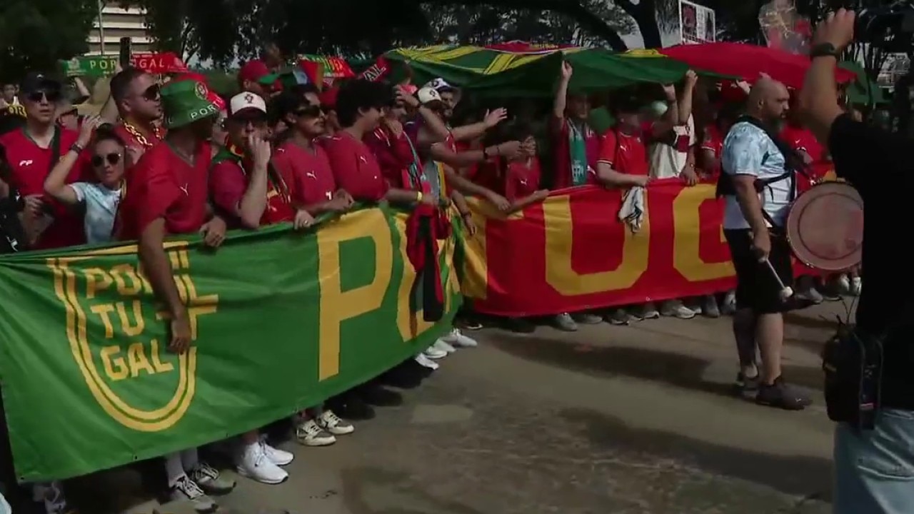 Uzbekistan, Portgual fans march to Houston Stadium for FIFA World Cup match