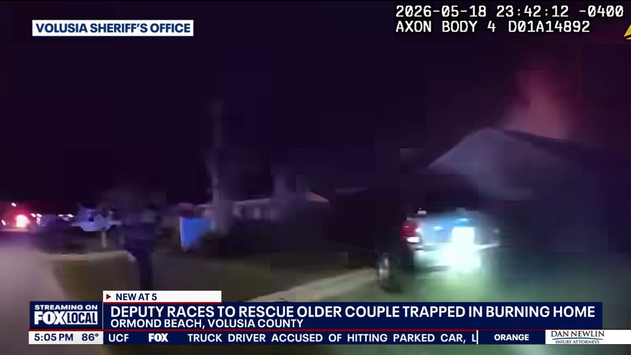 Deputy towards into house fire, helps pull woman out