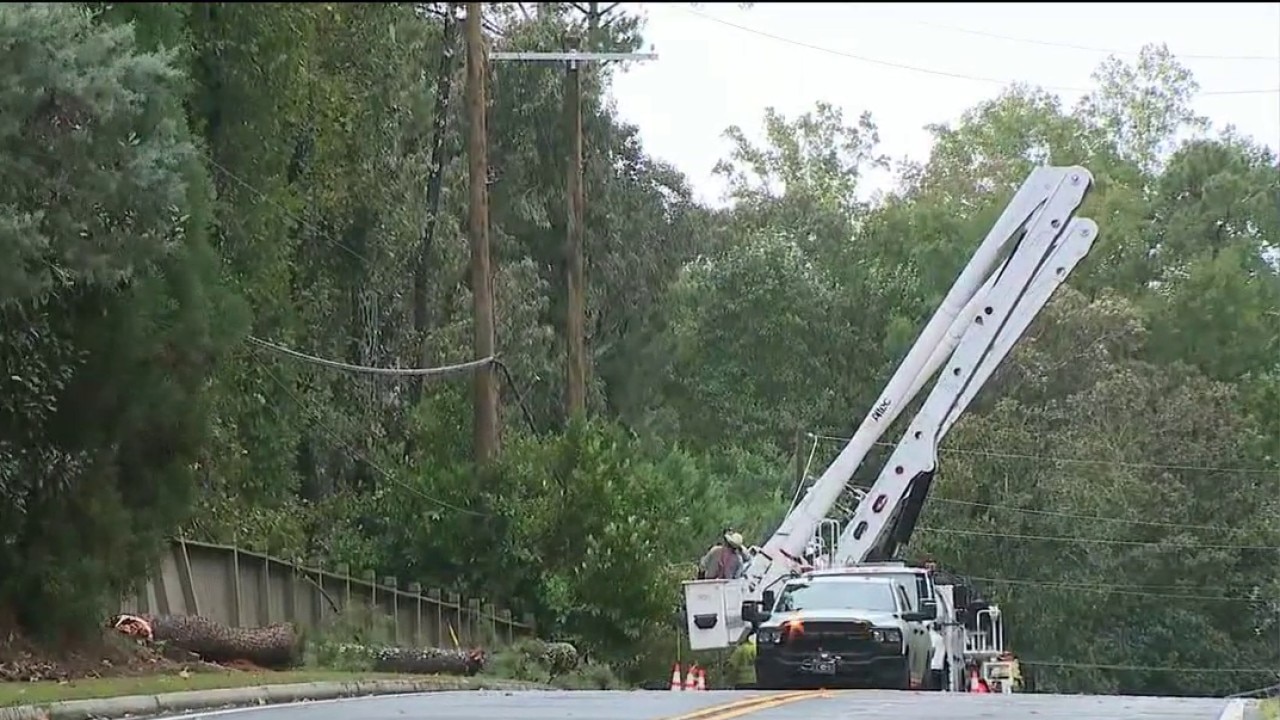 Cobb County utility crews clear fallen tree lines