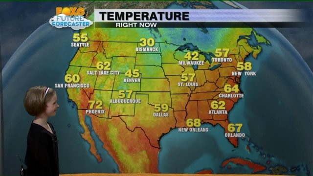 Bella De Sisti helps Meteorologist Rob Haswell with the weather